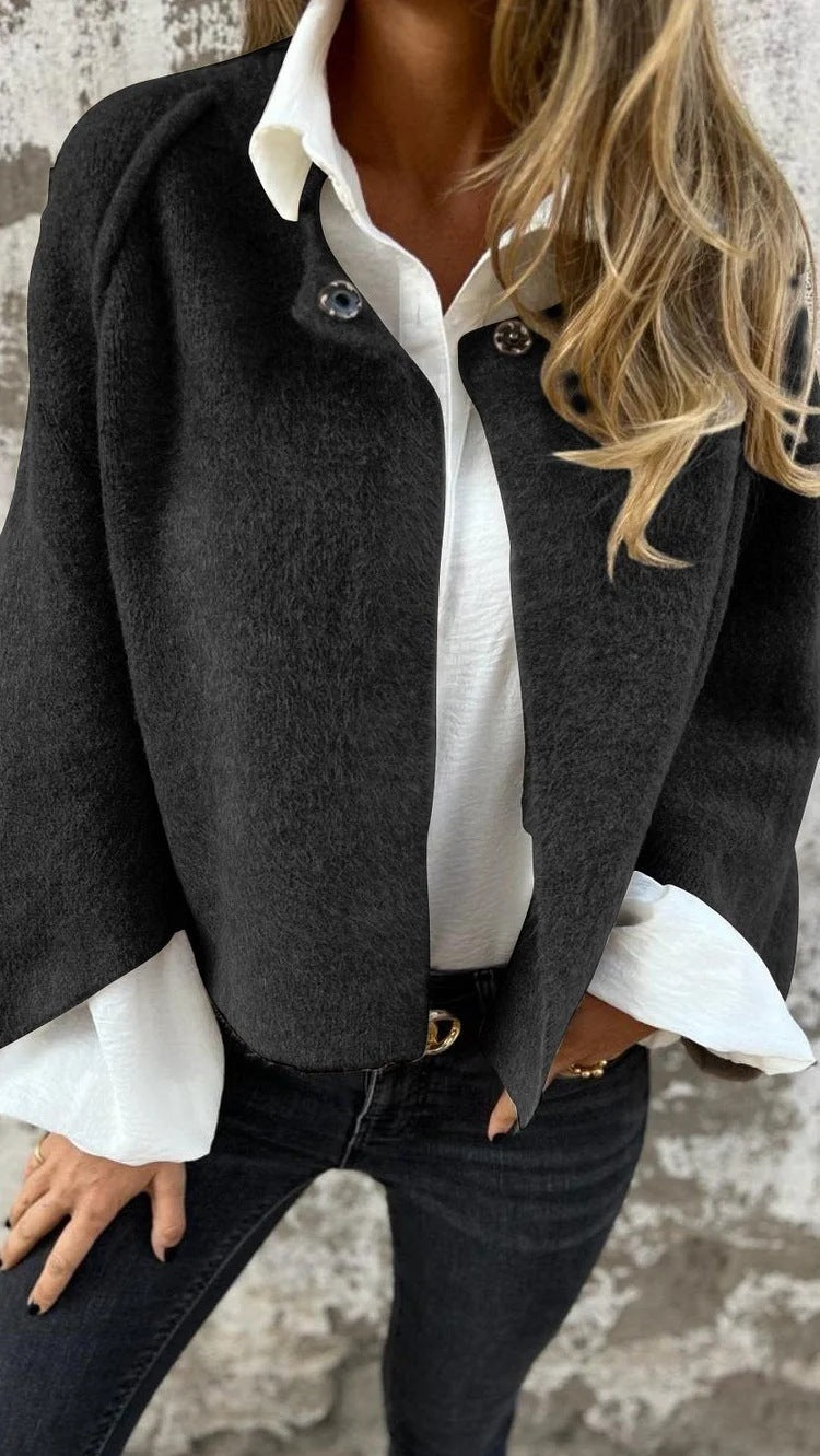 ELAINE | Veste courte avec des manches élégantes évasées null